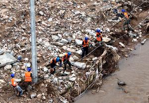 CHINA-HEBEI-XINGLONG-FUERTES LLUVIAS-OPERACIONES DE SOCORRO