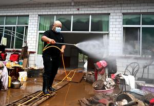 CHINA-HEBEI-XINGLONG-FUERTES LLUVIAS-OPERACIONES DE SOCORRO